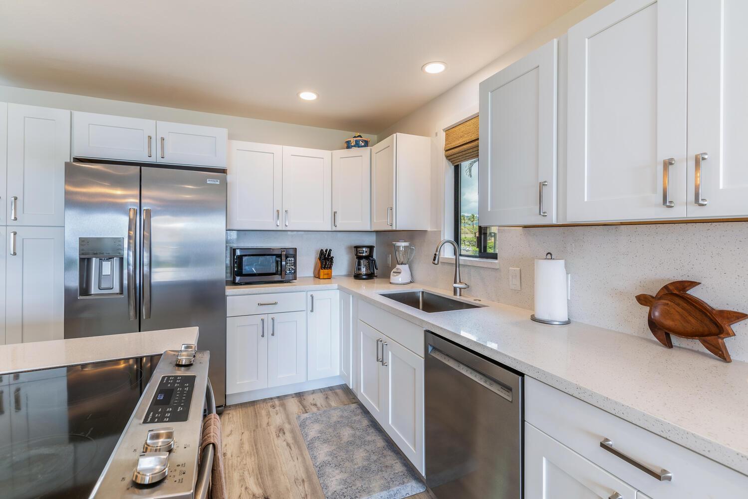 Kitchen has stainless steel appliances