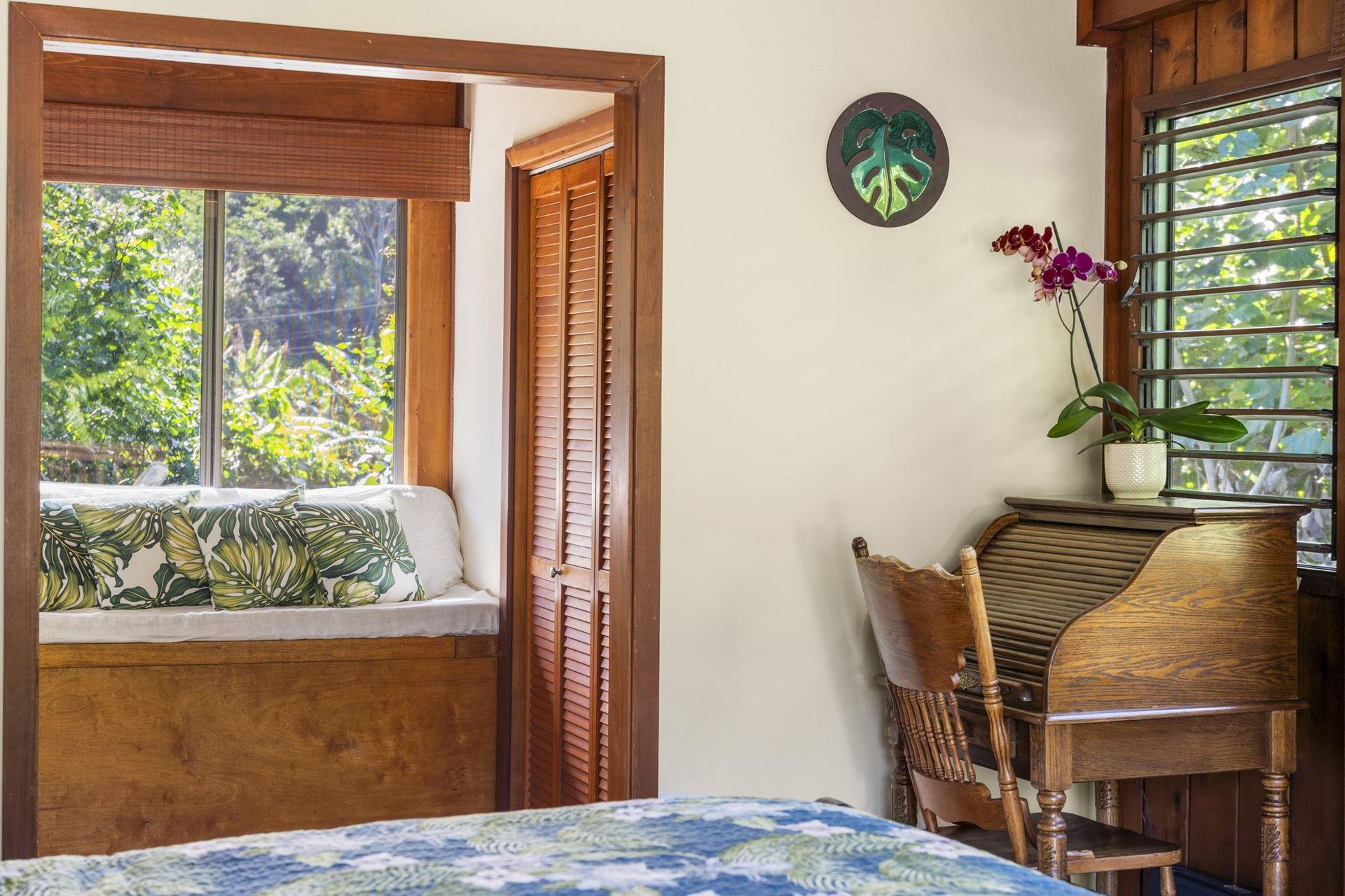 Master bedroom has desk and reading nook