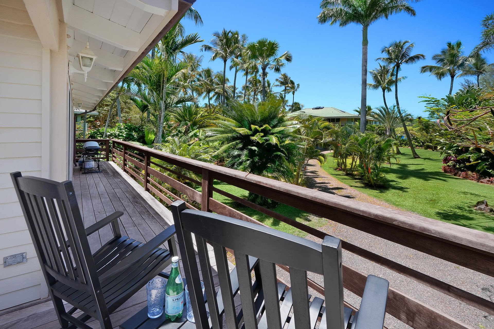 Relax on the lanai with a lush tropical view