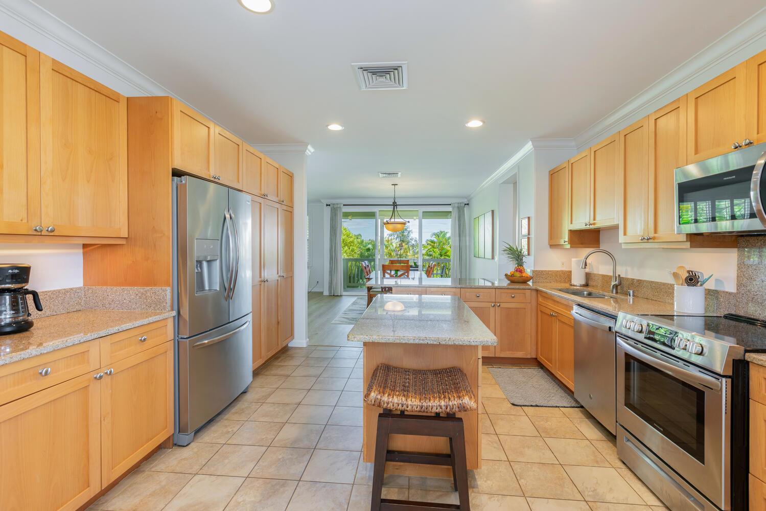 Kitchen is fully equipped with pots, pan and appliances