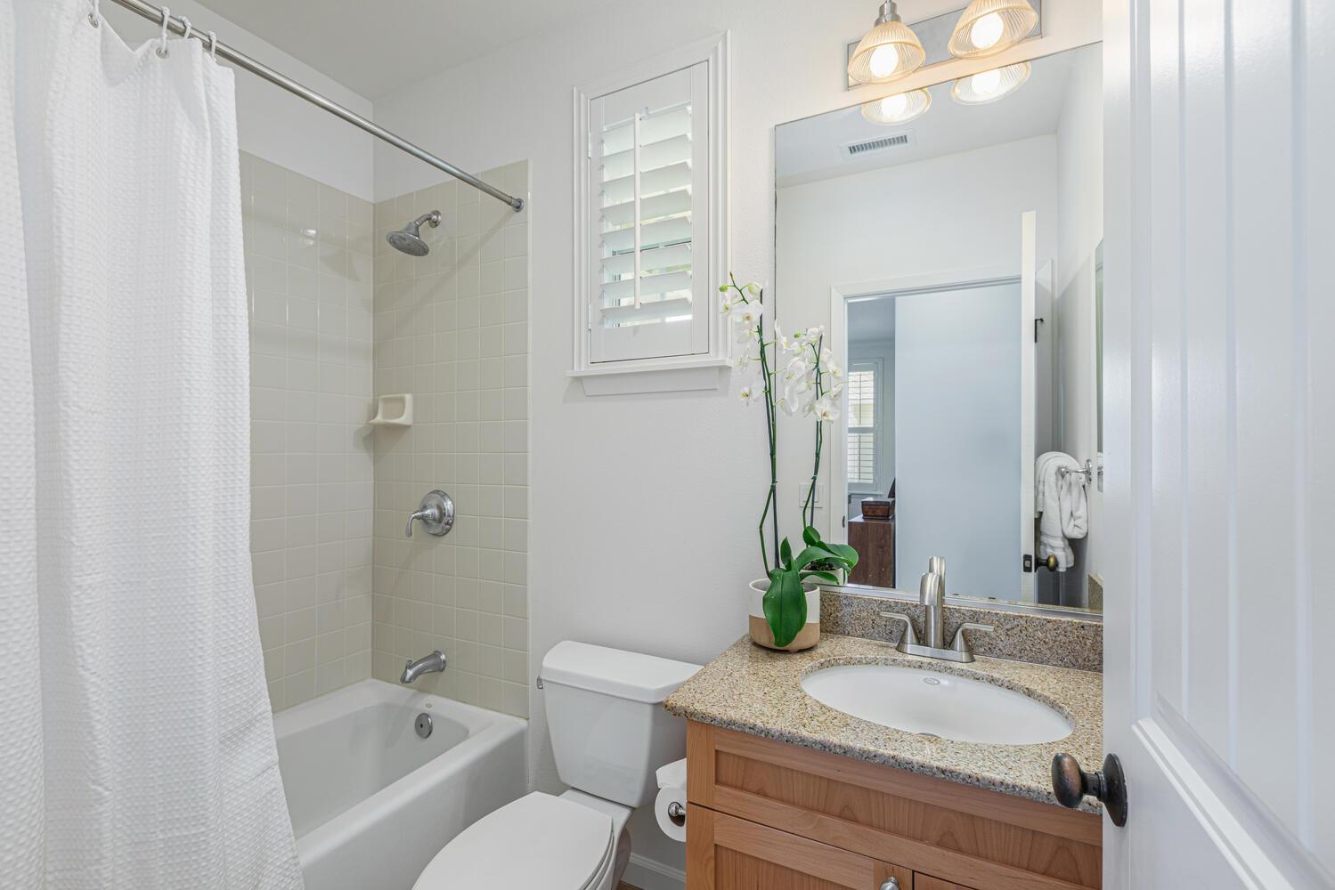 Third bathroom with shower and tub combo