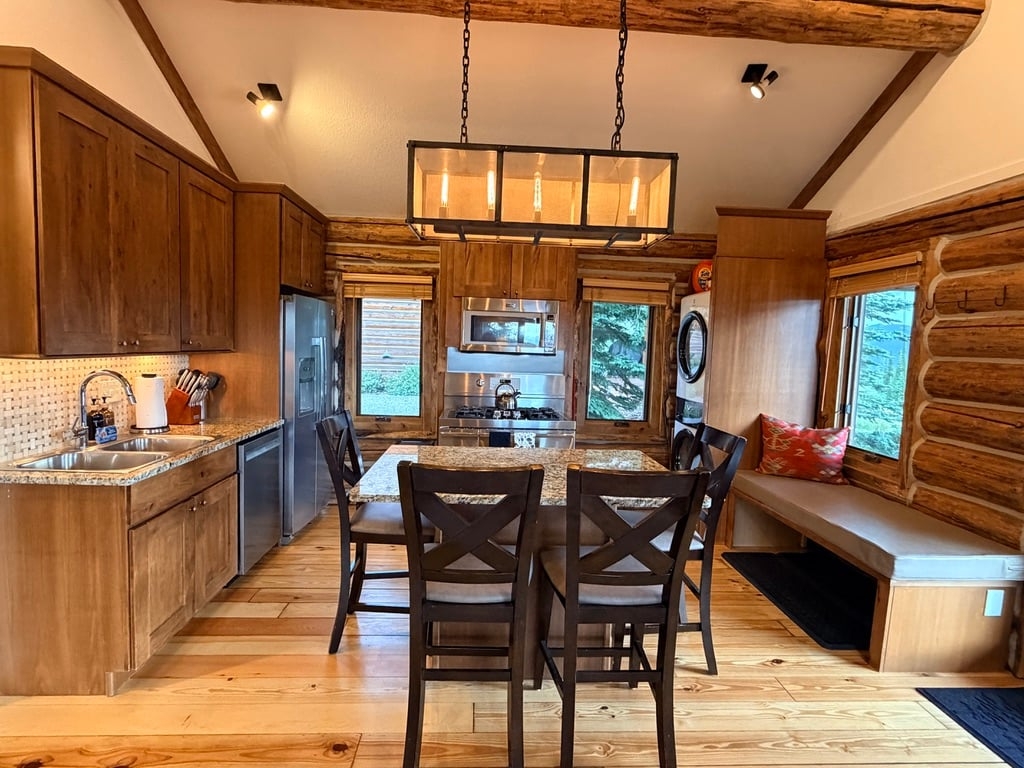 a kitchen with a dining table