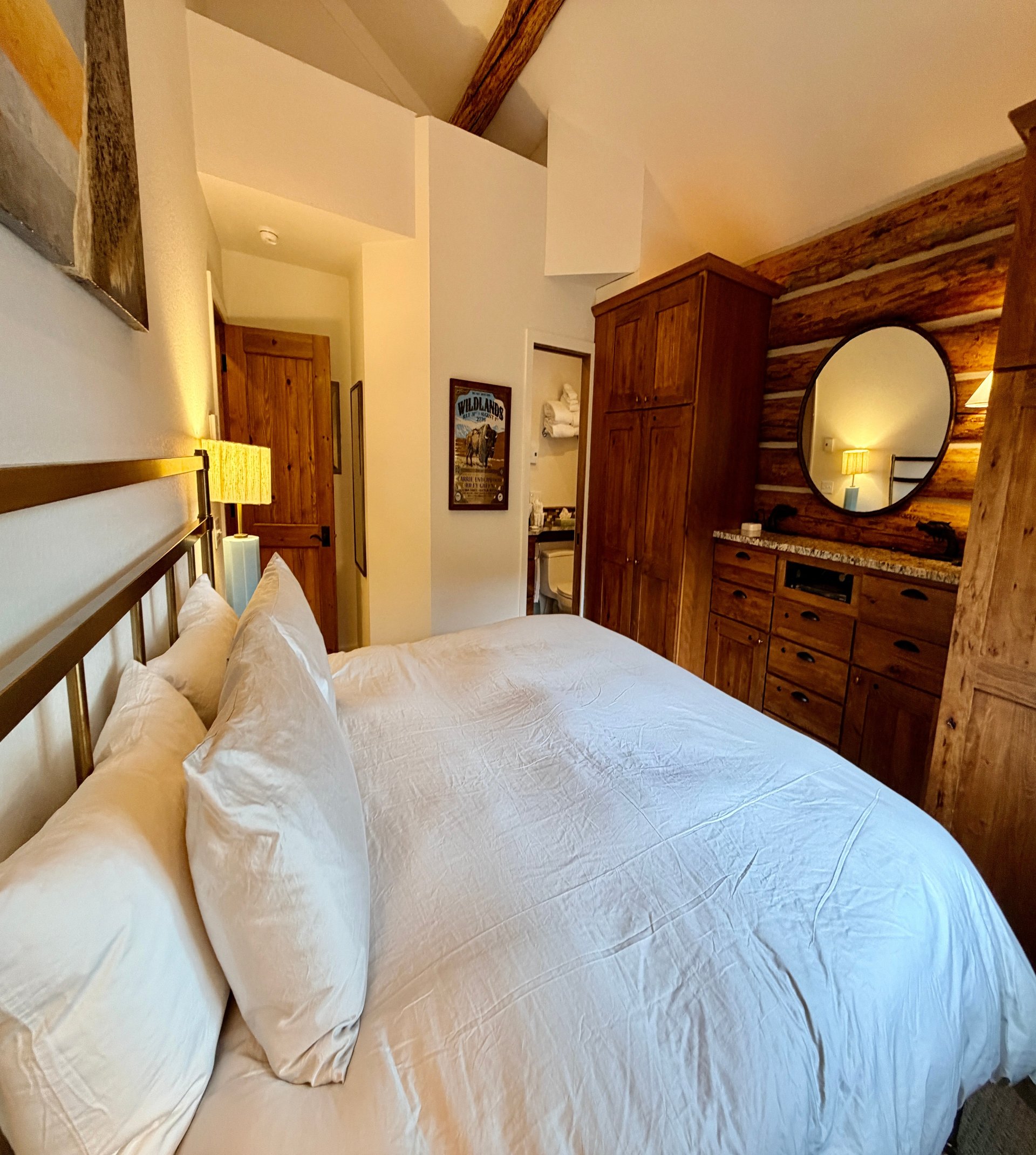 a bed with white sheets