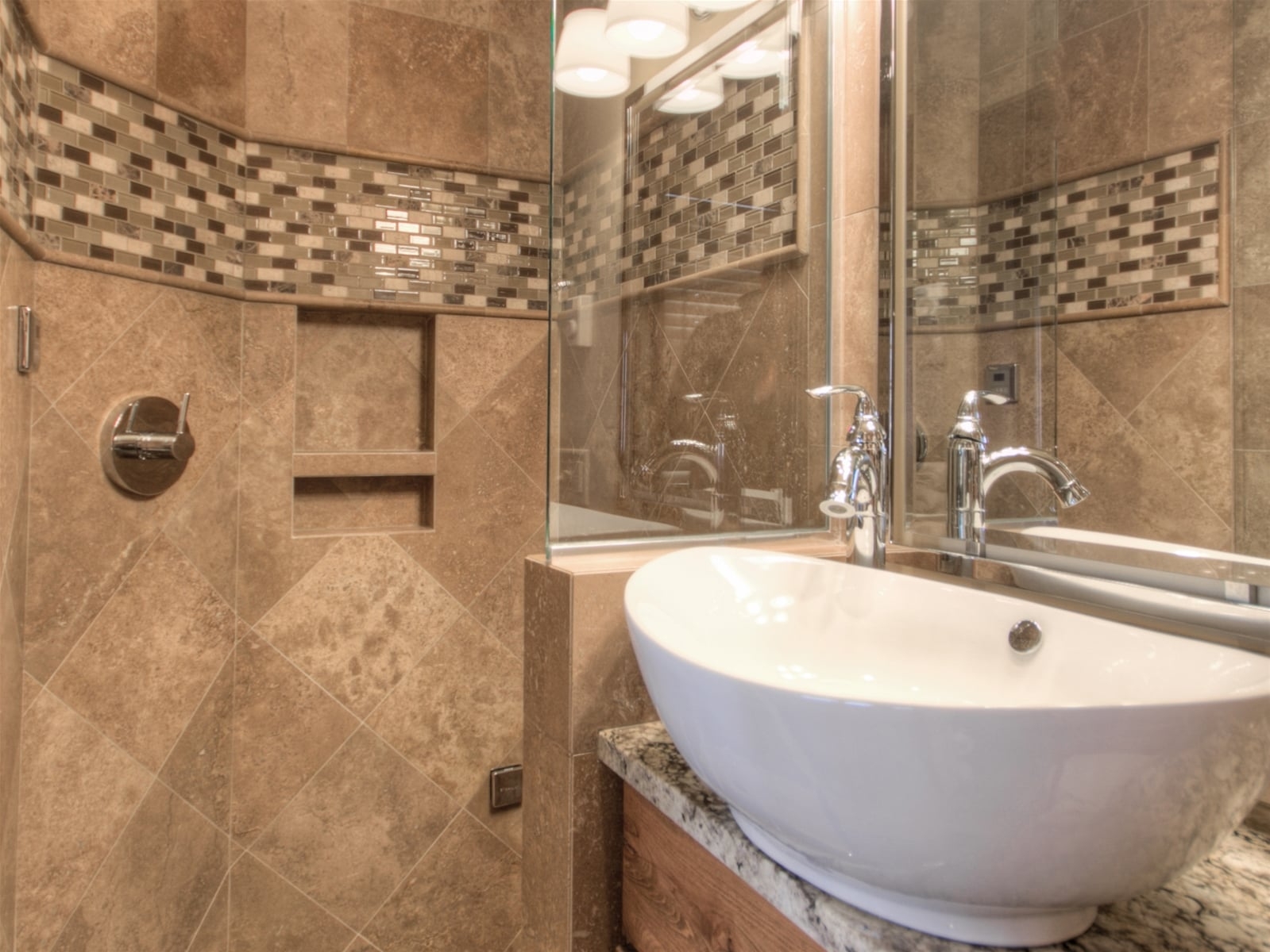 a bathroom with a large mirror