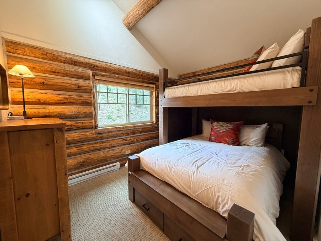 a bedroom with two beds