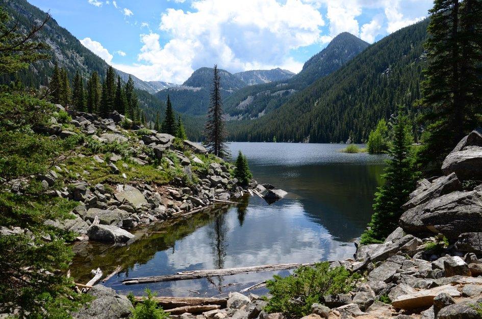a lake surrounded by mountains