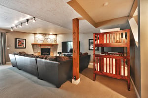 Wood frame twin bunk beds in the den