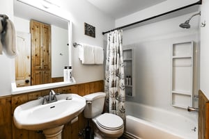 Full ensuite bathroom off the bedroom with showertub combo