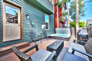 Private patio with patio furniture, gas outdoor fire pit and hot tub
