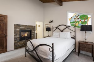 Main bedroom with stained glass accents