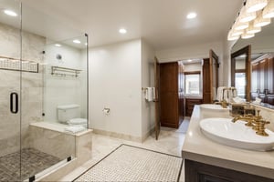 Double vanity bathroom with walk in closet