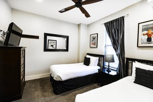 Twin beds in the guest bedroom can be converted to a king bed with advanced notice