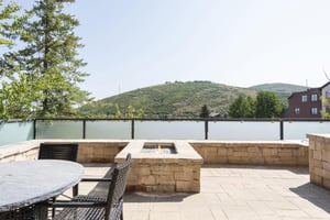Private patio with gas burning fireplace and patio table and chairs