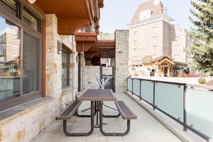 Large picnic table on the private patio with access to Park City Mountain Plaza
