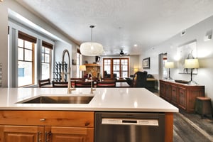Quartz countertops in the living room and wooden cabinetry