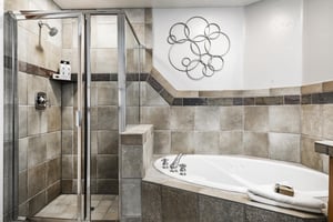 Enjoy the jetted soaking tub and separate walk in shower