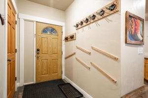 Entrance with equipment storage racks