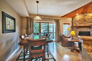 Dining room with solid wood table and seating for 6 adjacent the living room