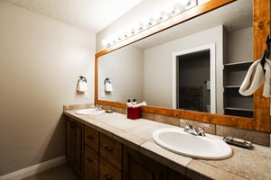 Ensuite main bedroom bath, double vanity and oversized vanity mirror