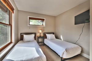 Twin beds can be made into a king bed with advanced notice, wall mounted flat screen TV