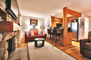 Living room looking into the bar  kitchen area