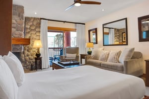 Relax on the queen murphy bed while taking in the views through the sliding glass door