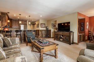 Living room features a flat screen TV