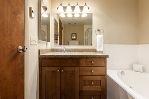 Bathroom is located down stairs
