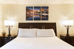Comfortable kingsized bed in the main bedroom