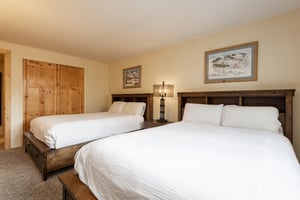 Queensized beds in the guest bedroom