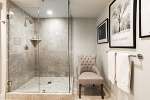 Ensuite main bathroom features a beautiful tiled walkin shower