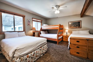 The loft features two doublesized beds and a twindouble bunk bed, all made with crisp white linens