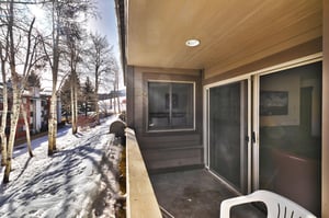 The private patio looks over a grove of Aspen trees