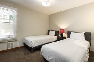 Second bedroom features two twinsized beds