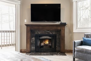 Relax by the cozy fire after a day on the slopes