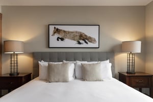 Main bedroom features a kingsized bed