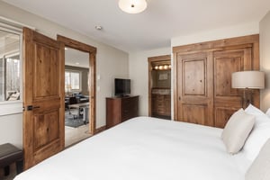 Main bedroom with kingsized bed and flat screen TV