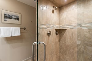 Beautiful tiled walkin shower in the main bathroom