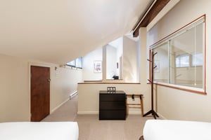 Three twin beds in the loft