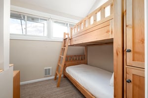Twin bunk beds in the loft