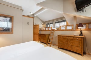 Two twin beds in the loft sleeping area