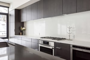 Fully equipped chefs kitchen with gas range, microwave drawer, kitchen island