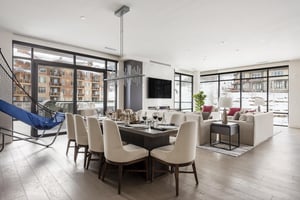 Elegant dining room with living room in the background