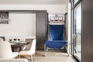 Kids and adults alike can work on their game with the PopAShot dual basketball hoop game in the dining room