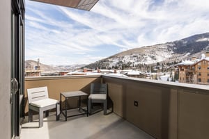Main bedroom secluded relaxation on the private patio overlooking the mountains