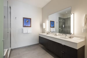 Ensuite private bathroom, floating cabinetry, double vanity white quartz counters
