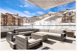 Striking ski resort views from the private main patio with gas firepit and spacious outdoor seating