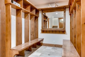 Mud room and equipment storage in solid wood lockers with plenty of space for ski gear or summer layers