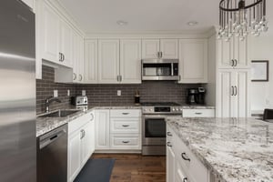 Granite countertops and stainless steel appliances