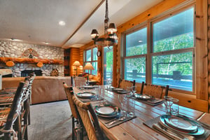 Solid wood dining table with seating for 6, dining room opens to living room and kitchen